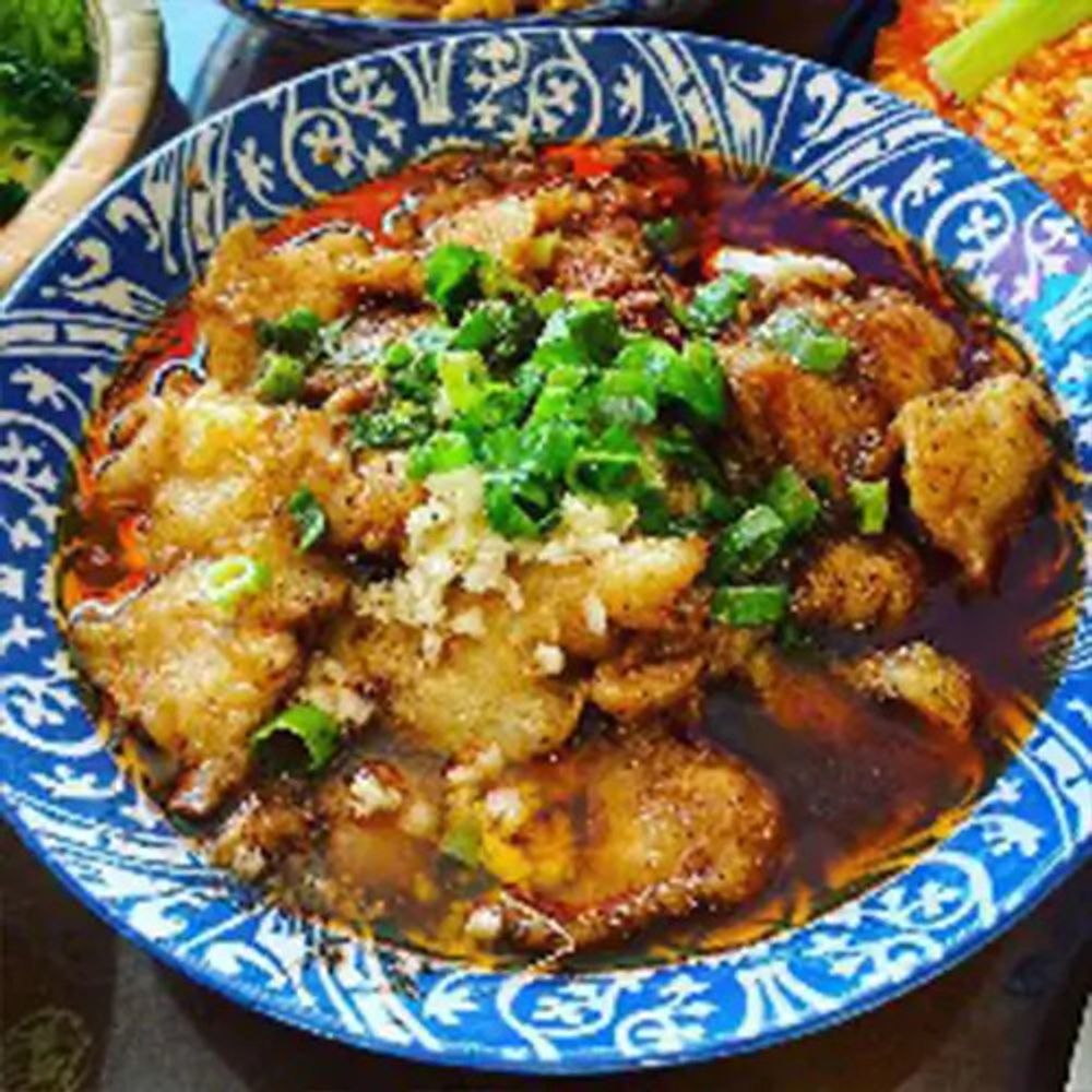 Sichuan spicy fish with scallions and garlic at Asia Wok, a Chinese Restaurant in Waltham
